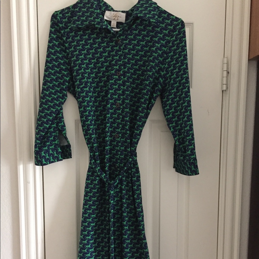 Blue dress with green horse pattern